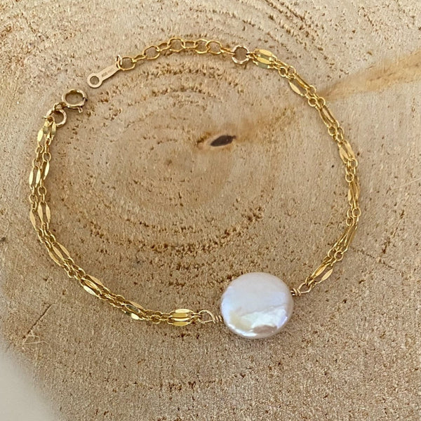 bracelet angele en plaqué or gold filled 14k composé d'une double chaîne à maille brillante et d'une perle d'eau douce